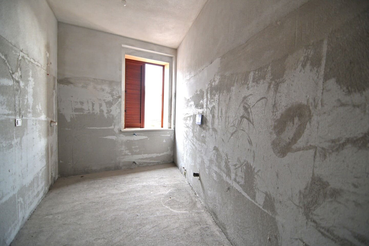 Appartamento trilocale in centro da ultimare
